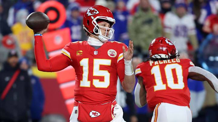 Jan 26, 2025; Kansas City, MO, USA; Kansas City Chiefs quarterback Patrick Mahomes (15) drops back to pass against the Buffalo Bills during the first quarter in the AFC Championship game at GEHA Field at Arrowhead Stadium. 