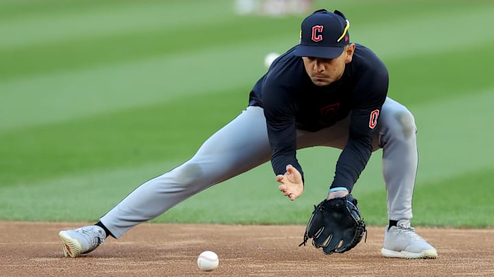 Oct 14, 2024; Bronx, New York, USA; Cleveland Guardians second baseman Andres Gimenez (0) fields ground balls before game one of the ALCS against the New York Yankees during the 2024 MLB Playoffs at Yankee Stadium. Mandatory Credit: Brad Penner-Imagn Images