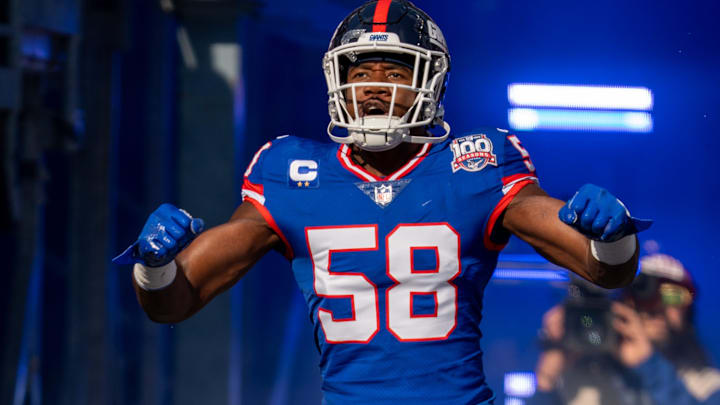 New York Giants LB Bobby Okereke runs onto the field to start the game between the Giants and the Commanders.