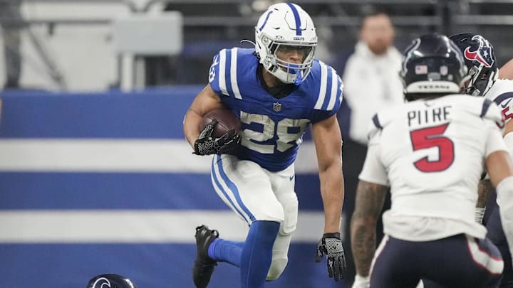 Jan 6, 2024; Indianapolis, Indiana, USA; Indianapolis Colts running back Jonathan Taylor (28) rushes the ball against the Houston Texans at Lucas Oil Stadium. Mandatory Credit: Robert Scheer-USA TODAY Sports