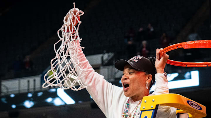 South Carolina Gamecocks head coach Dawn Staley cuts down the net as the Gamecocks celebrate their NCAA Regional Final game win over Duke at Legacy Arena in Birmingham Alabama, March 30, 2025.