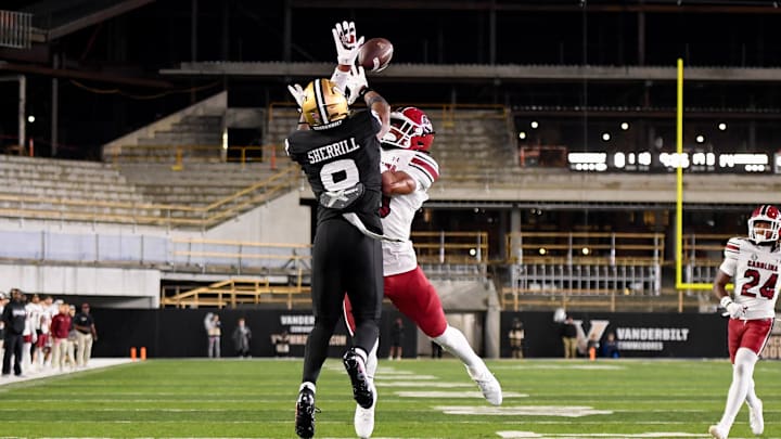 Nov 9, 2024; Nashville, Tennessee, USA;  South Carolina Gamecocks defensive back O'Donnell Fortune (3) breaks up the pass to Vanderbilt Commodores wide receiver Junior Sherrill (0) during the second half at FirstBank Stadium. Mandatory Credit: Steve Roberts-Imagn Images