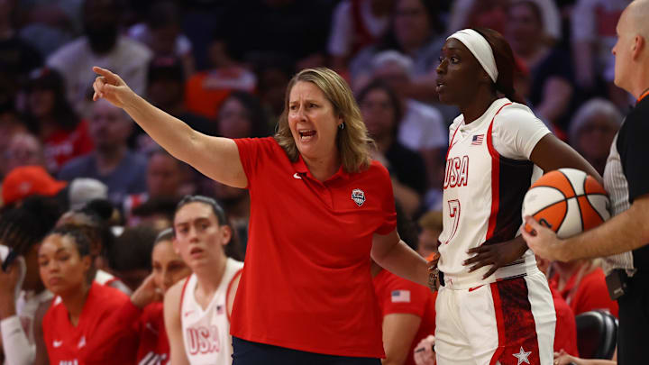 Jul 20, 2024; Phoenix, AZ, USA; USA Women's National Team head coach Cheryl Reeve with guard Kahleah Copper (7) during the WNBA All Star game at Footprint Center. Mandatory Credit: Mark J. Rebilas-Imagn Images