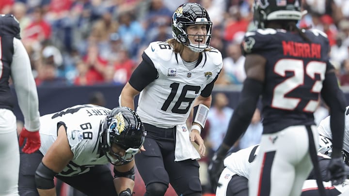Sep 29, 2024; Houston, Texas, USA; Jacksonville Jaguars quarterback Trevor Lawrence (16) at the line of scrimmage during the second quarter against the Houston Texans at NRG Stadium.