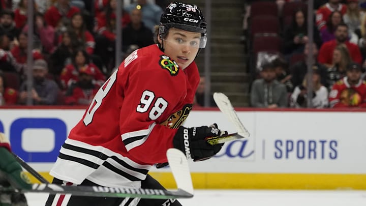 Oct 4, 2024; Chicago, Illinois, USA; Chicago Blackhawks center Connor Bedard (98) plays against the Minnesota Wild during the third period at United Center. Mandatory Credit: David Banks-Imagn Images