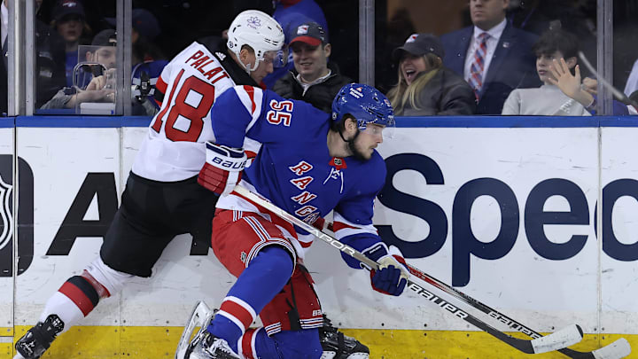Mar 11, 2024; New York, New York, USA; New York Rangers defenseman Ryan Lindgren (55) and New Jersey