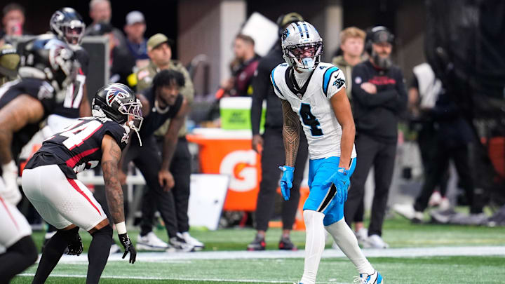 Nov 16, 2025; Atlanta, Georgia, USA; Carolina Panthers wide receiver Tetairoa McMillan (4) prepares for a play in the first half against the Atlanta Falcons at Mercedes-Benz Stadium. Mandatory Credit: Dale Zanine-Imagn Images Nov 16, 2025; Atlanta, Georgia, USA; Carolina Panthers wide receiver Tetairoa McMillan (4) prepares for a play in the first half against the Atlanta Falcons at Mercedes-Benz Stadium. Mandatory Credit: Dale Zanine-Imagn Images