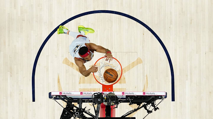 Denver Nuggets forward Bruce Brown (11) dunks against the Miami Heat during the 2023 NBA Finals at Ball Arena. 