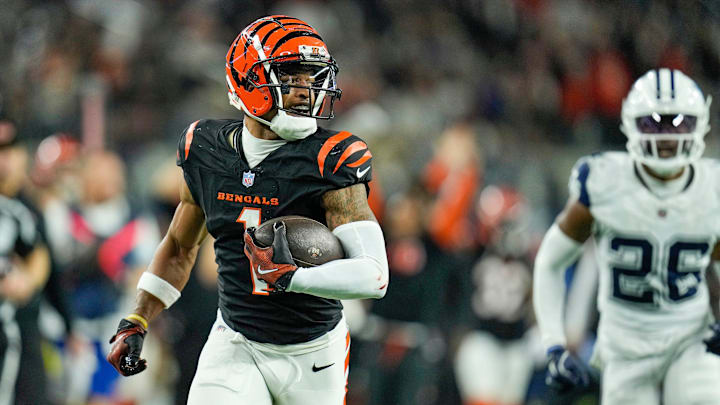 Cincinnati Bengals wide receiver Ja'Marr Chase (1) runs pass Dallas Cowboys cornerback DaRon Bland (26) in the 4th quarter for a touchdown during Monday Night Football at AT&T Stadium in Arlington,Texas on Monday, December 9, 2024. The Bengals won 27-20. Cincinnati Bengals wide receiver Ja'Marr Chase (1) runs pass Dallas Cowboys cornerback DaRon Bland (26) in the 4th quarter for a touchdown during Monday Night Football at AT&T Stadium in Arlington,Texas on Monday, December 9, 2024. The Bengals won 27-20.