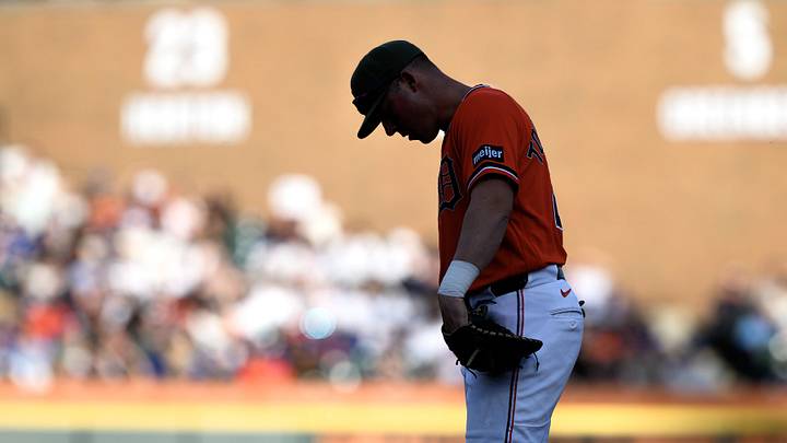 Detroit Tigers first baseman Spencer Torkelson (20) looks at the infield dirt after coming up empty on a diving attempt to stop a line drive down the first base line.