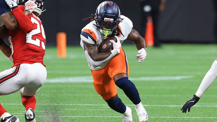 ATLANTA, GA - AUGUST 14: Jonah Coleman (20) of the Denver Broncos runs against the Atlanta Falcons. ATLANTA, GA - AUGUST 14: Jonah Coleman (20) of the Denver Broncos runs against the Atlanta Falcons.