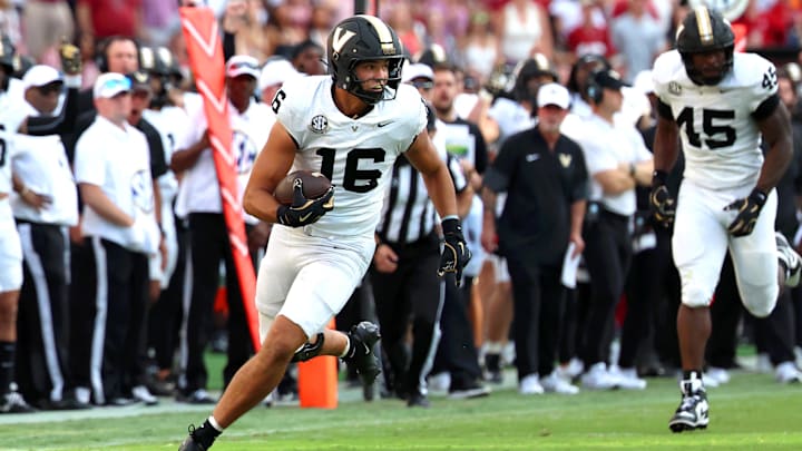 Oct 4, 2025; Tuscaloosa, Alabama, USA; Vanderbilt Commodores tight end Cole Spence (16) carries the ball during the second half against the Alabama Crimson Tide at Saban Field at Bryant-Denny Stadium. Mandatory Credit: David Leong-Imagn Images