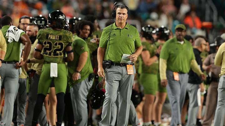 Oct 25, 2025; Miami Gardens, Florida, USA; Miami Hurricanes head coach Mario Cristobal looks on form the sideline against the Stanford Cardinal during the third quarter at Hard Rock Stadium. Mandatory Credit: Sam Navarro-Imagn Images Oct 25, 2025; Miami Gardens, Florida, USA; Miami Hurricanes head coach Mario Cristobal looks on form the sideline against the Stanford Cardinal during the third quarter at Hard Rock Stadium. Mandatory Credit: Sam Navarro-Imagn Images