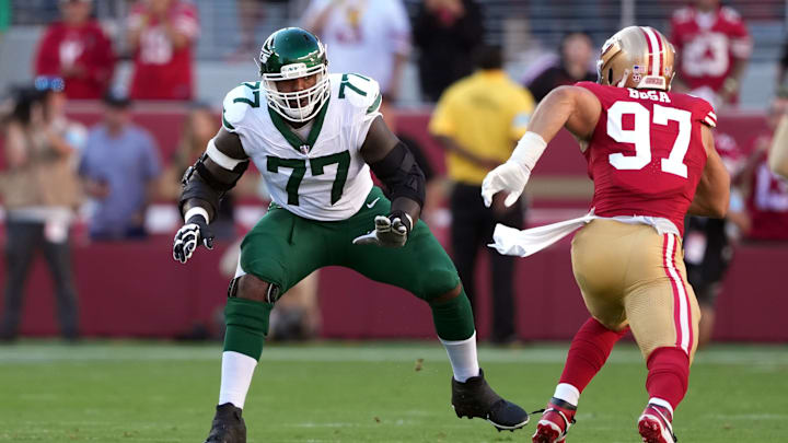Sep 9, 2024; Santa Clara, California, USA; New York Jets offensive tackle Tyron Smith (77) blocks against San Francisco 49ers defensive end Nick Bosa (97) during the first quarter at Levi's Stadium. Sep 9, 2024; Santa Clara, California, USA; New York Jets offensive tackle Tyron Smith (77) blocks against San Francisco 49ers defensive end Nick Bosa (97) during the first quarter at Levi's Stadium.