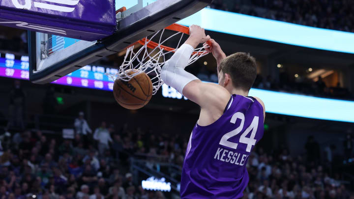 Mar 25, 2024; Salt Lake City, Utah, USA; Utah Jazz center Walker Kessler (24) dunks the ball against the Dallas Mavericks during the fourth quarter at Delta Center. Mandatory Credit: Rob Gray-USA TODAY Sports