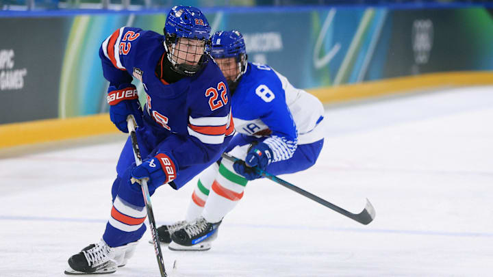 Feb 13, 2026; Milan, Italy; Tessa Janecke of United States in action with Anna Caumo of Italy in a women's ice hockey quarterfinal during the Milano Cortina 2026 Olympic Winter Games at Milano Rho Ice Hockey Arena. Mandatory Credit: Katie Stratman-Imagn Images Feb 13, 2026; Milan, Italy; Tessa Janecke of United States in action with Anna Caumo of Italy in a women's ice hockey quarterfinal during the Milano Cortina 2026 Olympic Winter Games at Milano Rho Ice Hockey Arena. Mandatory Credit: Katie Stratman-Imagn Images