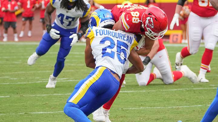 Aug 15, 2026; Kansas City, Missouri, USA; Los Angeles Rams wide receiver Jordan Whittington (88) runs the ball as Los Angeles Rams cornerback Nyzier Fourqurean (25) makes the tackle during the second half of the pre season game at Arrowhead Stadium. Mandatory Credit: Denny Medley-Imagn Images