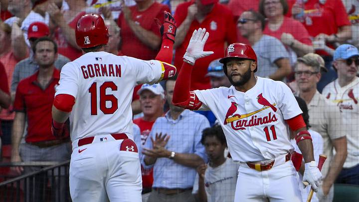 Jun 24, 2025; St. Louis, Missouri, USA;  St. Louis Cardinals designated hitter Nolan Gorman (16) is congratulated by center fielder Victor Scott II (11) after hitting a solo home run against the Chicago Cubs during the fourth inning at Busch Stadium. Mandatory Credit: Jeff Curry-Imagn Images
