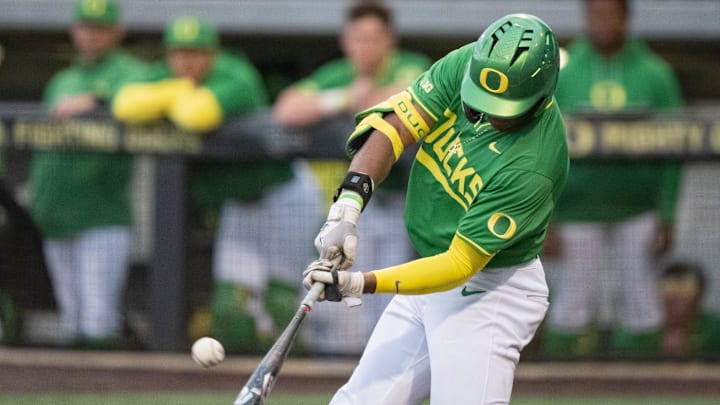 Oregon first baseman Jacob Walsh hits a home run in the seventh inning as the Oregon Ducks host the Oregon State Beavers on April 25, 2025, at PK Park in Eugene.