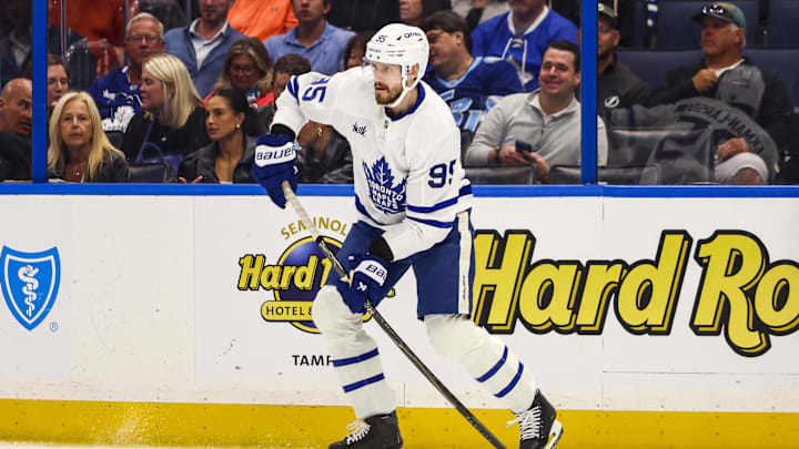 Feb 25, 2026; Tampa, Florida, USA; Toronto Maple Leafs defenseman Oliver Ekman-Larsson (95) handles the puck during the first period at Benchmark International Arena. Mandatory Credit: Morgan Tencza-Imagn Images