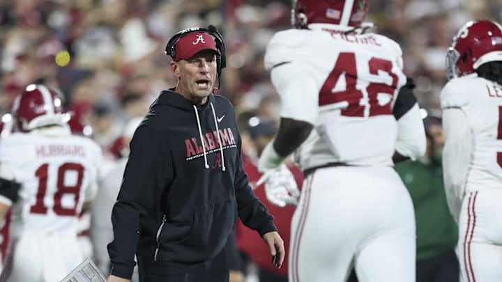 Dec 19, 2025; Norman, OK, USA; Alabama Crimson Tide head coach Kalen Deboer calls out from the sidelines in the first half against the Oklahoma Sooners at Gaylord Family OK Memorial Stadium. Mandatory Credit: Nelson Chenault-Imagn Images