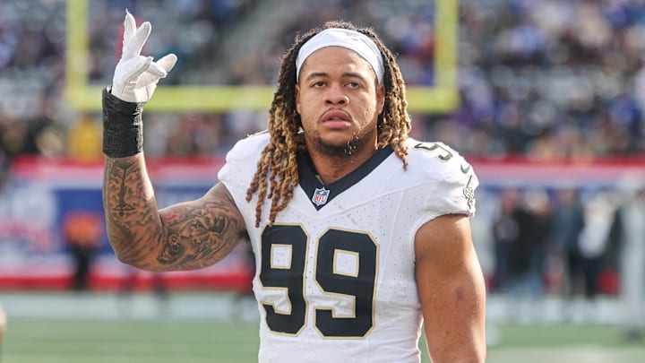 Dec 8, 2024; East Rutherford, New Jersey, USA; New Orleans Saints defensive end Chase Young (99) looks up at fans before the game against the New York Giants at MetLife Stadium. Mandatory Credit: Vincent Carchietta-Imagn Images