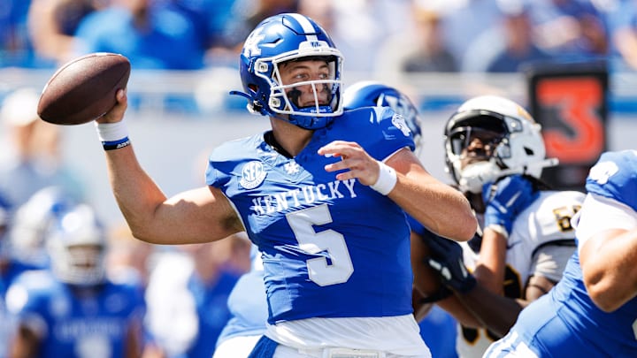 Aug 30, 2025; Lexington, Kentucky, USA; Kentucky Wildcats quarterback Zach Calzada (5) throws a pass during the first quarter against the Toledo Rockets at Kroger Field. Mandatory Credit: Jordan Prather-Imagn Images