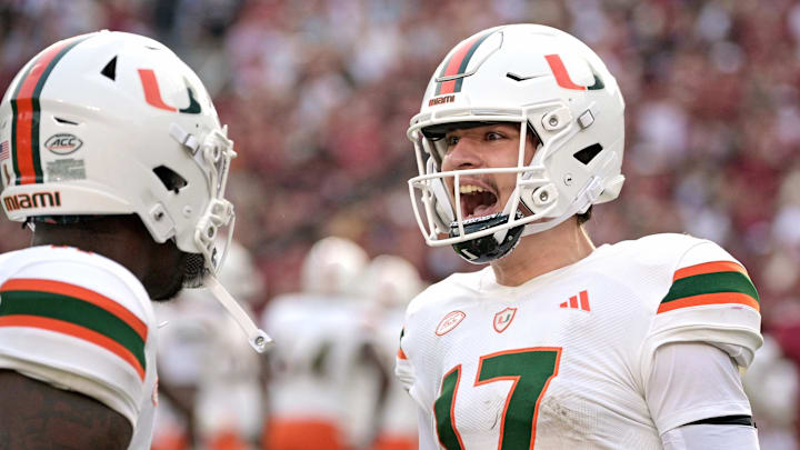 Nov 11, 2023; Tallahassee, Florida, USA; Miami Hurricanes quarterback Emory Williams (17) celebrates a touchdown pass against the Florida State Seminoles during the second half at Doak S. Campbell Stadium. Mandatory Credit: Melina Myers-Imagn Images Nov 11, 2023; Tallahassee, Florida, USA; Miami Hurricanes quarterback Emory Williams (17) celebrates a touchdown pass against the Florida State Seminoles during the second half at Doak S. Campbell Stadium. Mandatory Credit: Melina Myers-Imagn Images