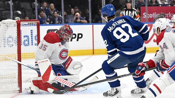 Sep 19, 2026; Toronto, Ontario, CAN;  Montreal Canadiens goalie Sam Montembeault (35) makes a save on a shot from Toronto Maple Leafs forward Gavin McKenna (92) in the first period at Scotiabank Arena.  Mandatory Credit: Dan Hamilton-Imagn Images