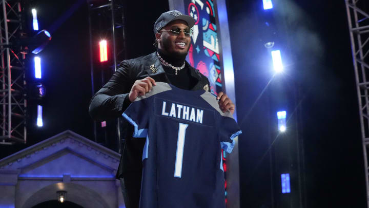 Apr 25, 2024; Detroit, MI, USA; Alabama Crimson Tide offensive lineman JC Latham poses after being selected by the Tennessee Titans as the No. 7 pick in the first round of the 2024 NFL Draft at Campus Martius Park and Hart Plaza. Mandatory Credit: Kirby Lee-USA TODAY Sports