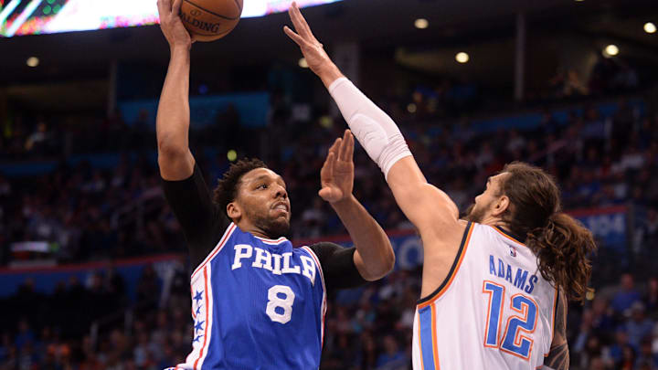 Mar 22, 2017; Oklahoma City, OK, USA; Philadelphia 76ers center Jahlil Okafor (8) shoots the ball over Oklahoma City Thunder center Steven Adams (12) during the first quarter at Chesapeake Energy Arena. Mandatory Credit: Mark D. Smith-Imagn Images