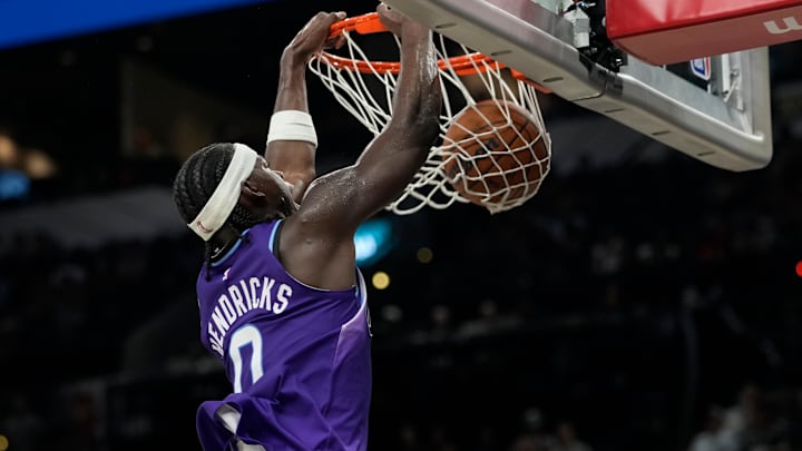 Oct 10, 2025; San Antonio, Texas, USA; Utah Jazz forward Taylor Hendricks (0) dunks during the second half the San Antonio Spurs at Frost Bank Center. Mandatory Credit: Scott Wachter-Imagn Images