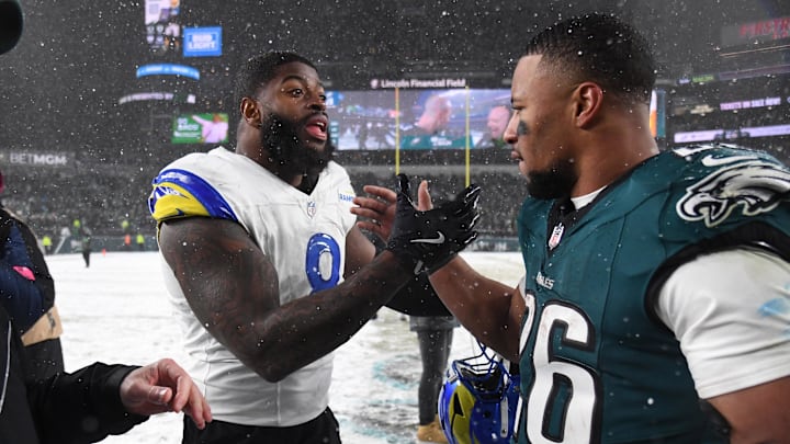 Jan 19, 2025; Philadelphia, Pennsylvania, USA; Los Angeles Rams linebacker Jared Verse (8) greets Philadelphia Eagles running back Saquon Barkley (26) after their 2025 NFC divisional round game at Lincoln Financial Field. Mandatory Credit: Eric Hartline-Imagn Images Jan 19, 2025; Philadelphia, Pennsylvania, USA; Los Angeles Rams linebacker Jared Verse (8) greets Philadelphia Eagles running back Saquon Barkley (26) after their 2025 NFC divisional round game at Lincoln Financial Field. Mandatory Credit: Eric Hartline-Imagn Images