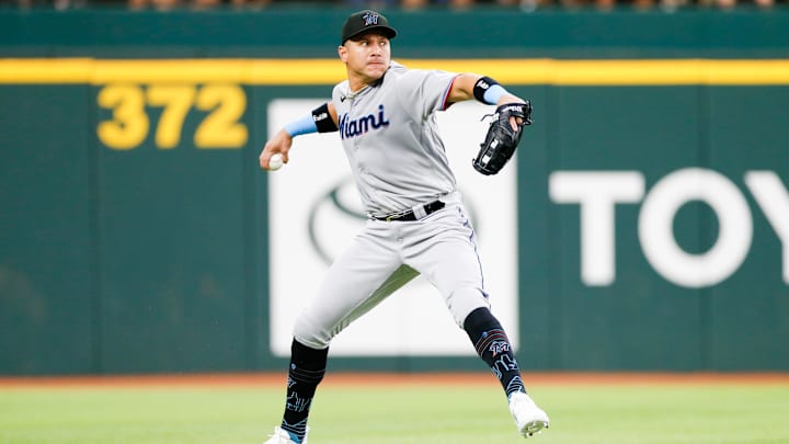 Aug 6, 2023; Arlington, Texas, USA; Miami Marlins right fielder Avisail Garcia (24) fields a ground