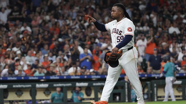 Sep 24, 2024; Houston, Texas, USA; Houston Astros starting pitcher Framber Valdez (59) points to the dugout after he was taken out in the sixth inning against the Seattle Mariners at Minute Maid Park. 