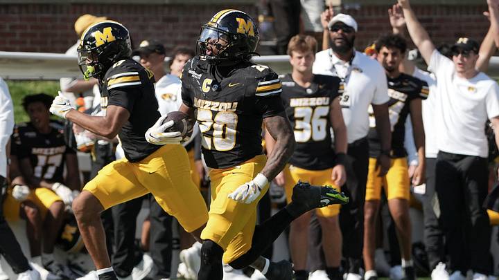 Oct 10, 2026; Columbia, Missouri, USA; Missouri Tigers running back Jamal Roberts (20) scores against the Texas A&M Aggies during the second half of the game at Faurot Field at Memorial Stadium. Mandatory Credit: Denny Medley-Imagn Images Oct 10, 2026; Columbia, Missouri, USA; Missouri Tigers running back Jamal Roberts (20) scores against the Texas A&M Aggies during the second half of the game at Faurot Field at Memorial Stadium. Mandatory Credit: Denny Medley-Imagn Images