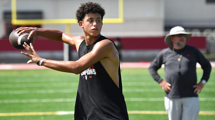 quarterback Davin Davidson passes the ball during 7-on-7 drills. Cardinal Mooney High football players participate in the school's summer strength and conditioning camp Monday, July 22, 2024. The Cougars won the FHSAA Class 1S state championship last year, defeating Trinity Catholic.
