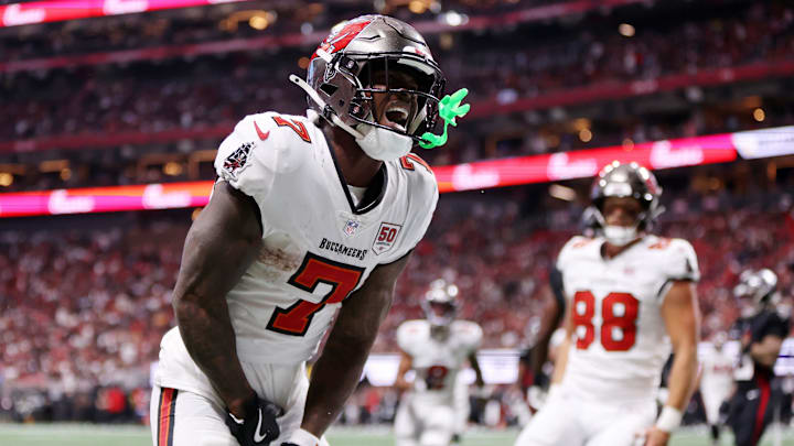 Tampa Bay Buccaneers running back Bucky Irving (7) celebrates after scoring a touchdown against the Atlanta Falcons during the third quarter at Mercedes-Benz Stadium. Tampa Bay Buccaneers running back Bucky Irving (7) celebrates after scoring a touchdown against the Atlanta Falcons during the third quarter at Mercedes-Benz Stadium.