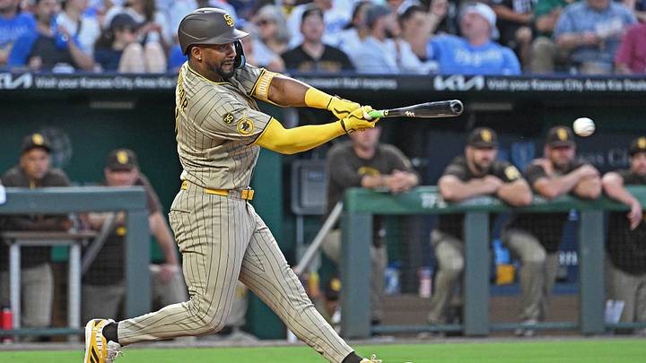 Jul 17, 2026; Kansas City, Missouri, USA;  San Diego Padres designated hitter Miguel Andujar (41) doubles in the fifth inning against the Kansas City Royals at Kauffman Stadium. Mandatory Credit: Peter Aiken-Imagn Images