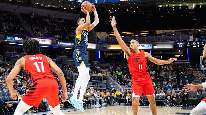 Nov 27, 2023; Indianapolis, Indiana, USA; Indiana Pacers guard Tyrese Haliburton (0) shoots the ball