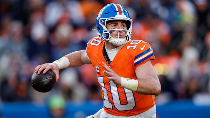 Denver Broncos quarterback Bo Nix (10) looks to pass in the third quarter against the Kansas City Chiefs at Empower Field at Mile High. 