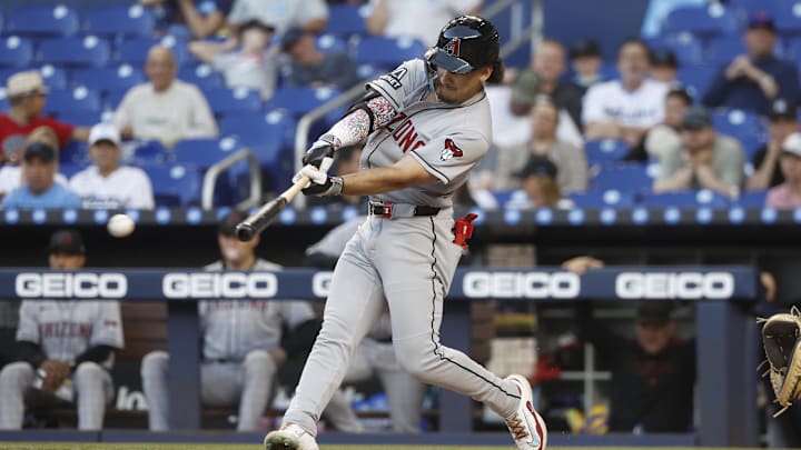 Apr 15, 2025; Miami, Florida, USA; Arizona Diamondbacks center fielder Alek Thomas (5) bats against the Miami Marlins during the second inning at loanDepot Park. All players wore #42 for Jackie Robinson Day. Mandatory Credit: Rhona Wise-Imagn Images Apr 15, 2025; Miami, Florida, USA; Arizona Diamondbacks center fielder Alek Thomas (5) bats against the Miami Marlins during the second inning at loanDepot Park. All players wore #42 for Jackie Robinson Day. Mandatory Credit: Rhona Wise-Imagn Images