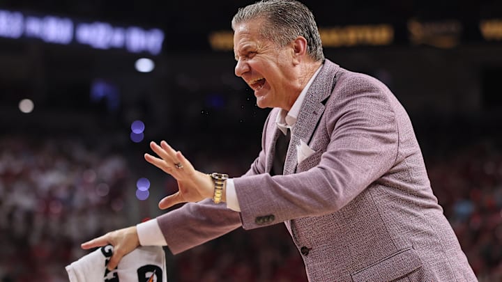 Arkansas Razorbacks head coach John Calipari reacts to a call in the second half of the game against the Tennessee Volunteers at Bud Walton Arena. 