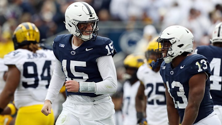 Penn State Nittany Lions quarterback Drew Allar (15) celebrates with running back Kaytron Allen (13) Penn State Nittany Lions quarterback Drew Allar (15) celebrates with running back Kaytron Allen (13)