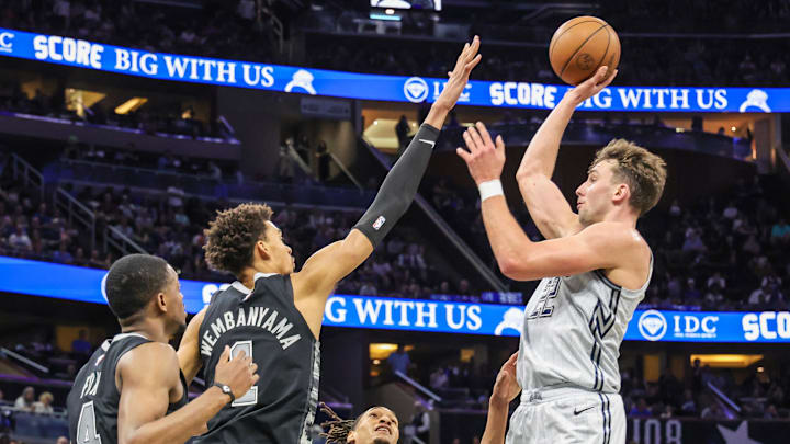 Orlando Magic forward Franz Wagner (22) shoots against San Antonio Spurs center Victor Wembanyama (1) during the second quarter at Kia Center.