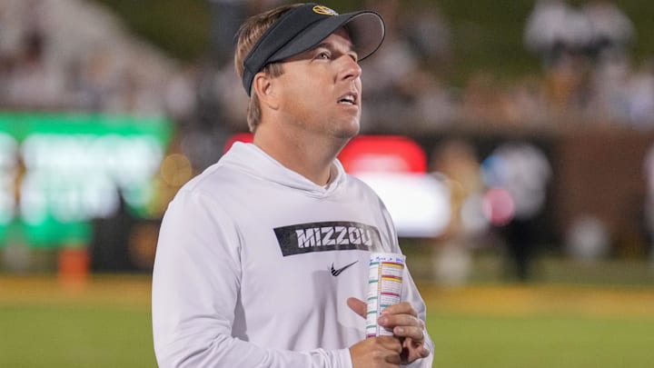 Sep 7, 2024; Columbia, Missouri, USA; Missouri Tigers head coach Eli Drinkwitz watches a replay against the Buffalo Bulls during the second half at Faurot Field at Memorial Stadium. Mandatory Credit: Denny Medley-Imagn Images