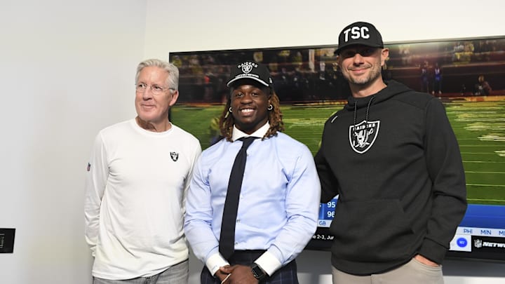 Apr 25, 2025; Henderson, NV, USA; (L-R) Las Vegas Raiders head coach Pete Carroll, Ashton Jeanty and general manager John Spytek pose after a news conference introducing Jeanty as the first round draft pick in the 2025 NFL Draft at Intermountain Health Performance Center. Mandatory Credit: Candice Ward-Imagn Images