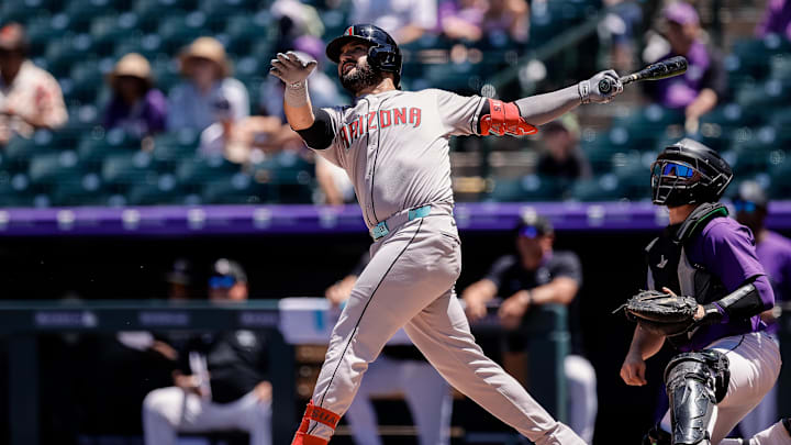 Jun 22, 2025; Denver, Colorado, USA; Arizona Diamondbacks third baseman Eugenio Suarez (28) watches his ball on a double in the second inning against the Colorado Rockies at Coors Field. Mandatory Credit: Isaiah J. Downing-Imagn Images Jun 22, 2025; Denver, Colorado, USA; Arizona Diamondbacks third baseman Eugenio Suarez (28) watches his ball on a double in the second inning against the Colorado Rockies at Coors Field. Mandatory Credit: Isaiah J. Downing-Imagn Images