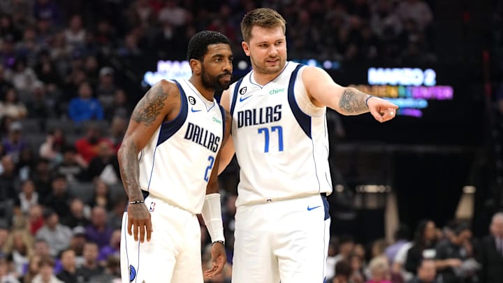 Feb 11, 2023; Sacramento, California, USA; Dallas Mavericks guard Kyrie Irving (2) and guard Luka