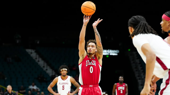  UNLV Rebels guard Dra Gibbs-Lawhorn (0) shoots a free throw in the second half against Alabama Crimson Tide in a 2025 Players Era Festival group play game at MGM Grand Garden Arena. Mandatory Credit: Stephen R. Sylvanie-Imagn Images